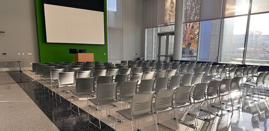 ANR room 101A with all chairs forward facing the front of the classroom in rows.