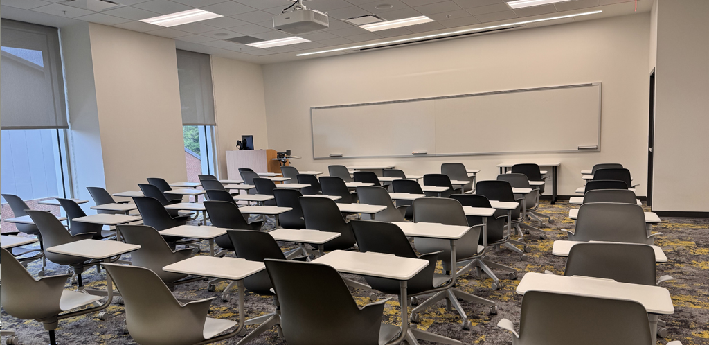 Ag and Natural Resources room 135 showing node chairs and instructor podium near whiteboards