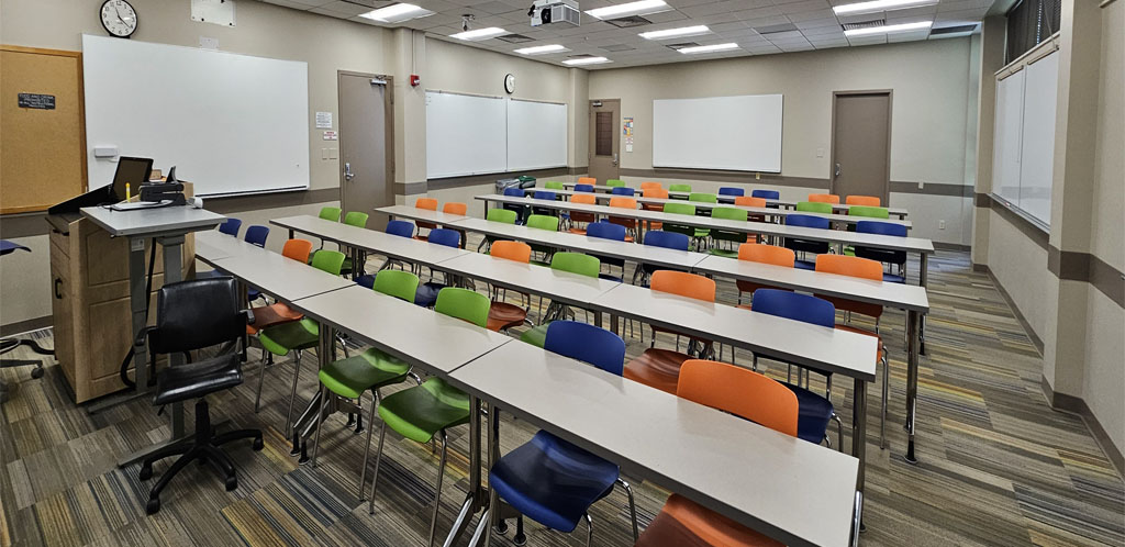 Biosystems engineering room 268 showing student tables and chairs with instructor podium at front