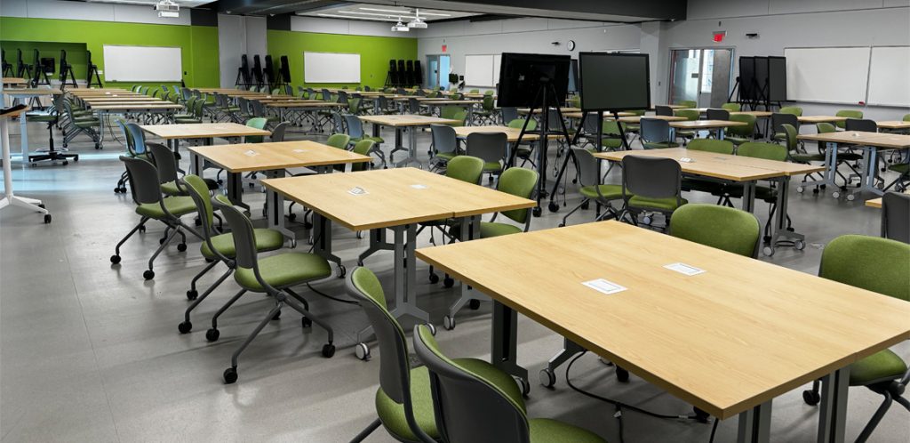 Zeanah rooms 270, 271, 277, 278. tables and chairs lines across the classrooms.