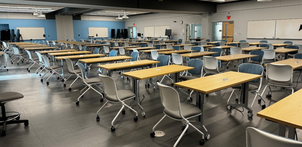 Zeanah Rooms 370,371,377, and 378 with tables and chairs lined across the classroom